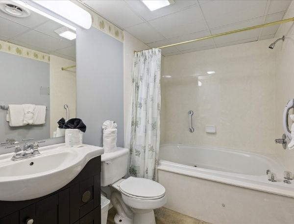 One Bedroom Whispering Pines Pigeon Forge Mountain Vacation Condo Rental by Smoky Mountain Escapes with Indoor Pool Outdoor Pool Lazy River Near Dollywood