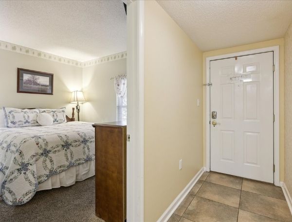 One Bedroom Whispering Pines Pigeon Forge Mountain Vacation Condo Rental by Smoky Mountain Escapes with Indoor Pool Outdoor Pool Lazy River Near Dollywood
