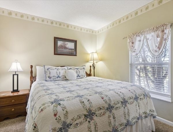One Bedroom Whispering Pines Pigeon Forge Mountain Vacation Condo Rental by Smoky Mountain Escapes with Indoor Pool Outdoor Pool Lazy River Near Dollywood