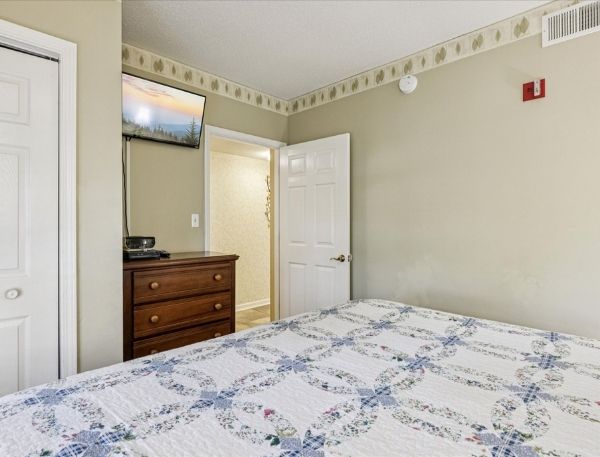 One Bedroom Whispering Pines Pigeon Forge Mountain Vacation Condo Rental by Smoky Mountain Escapes with Indoor Pool Outdoor Pool Lazy River Near Dollywood