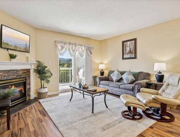 One Bedroom Whispering Pines Pigeon Forge Mountain Vacation Condo Rental by Smoky Mountain Escapes with Indoor Pool Outdoor Pool Lazy River Near Dollywood