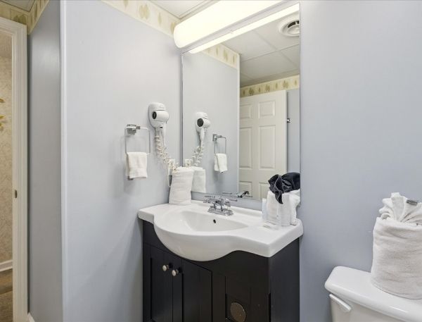 One Bedroom Whispering Pines Pigeon Forge Mountain Vacation Condo Rental by Smoky Mountain Escapes with Indoor Pool Outdoor Pool Lazy River Near Dollywood