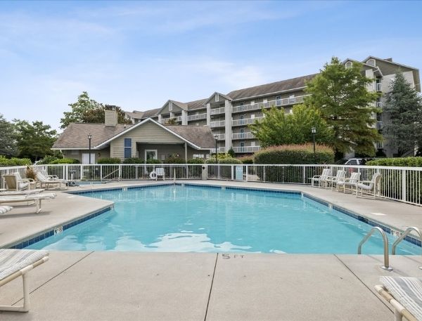 One Bedroom Whispering Pines Pigeon Forge Mountain Vacation Condo Rental by Smoky Mountain Escapes with Indoor Pool Outdoor Pool Lazy River Near Dollywood