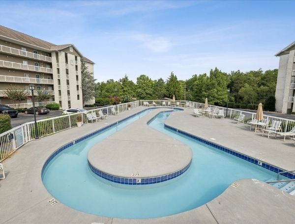 One Bedroom Whispering Pines Pigeon Forge Mountain Vacation Condo Rental by Smoky Mountain Escapes with Indoor Pool Outdoor Pool Lazy River Near Dollywood