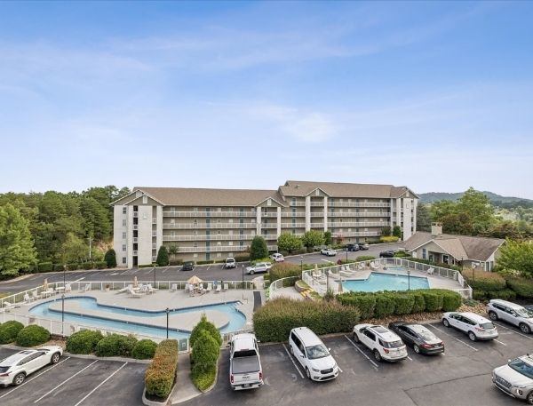 One Bedroom Whispering Pines Pigeon Forge Mountain Vacation Condo Rental by Smoky Mountain Escapes with Indoor Pool Outdoor Pool Lazy River Near Dollywood