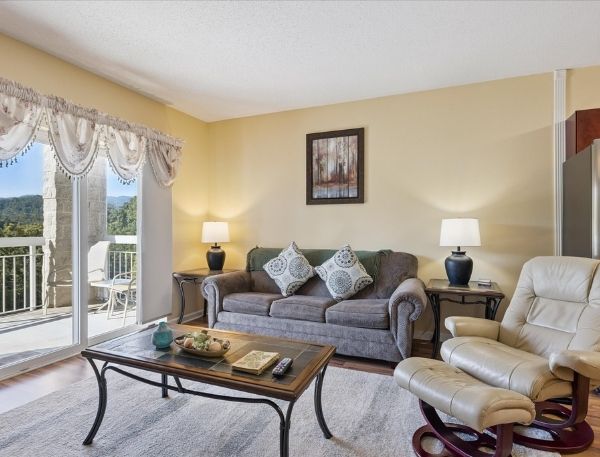 One Bedroom Whispering Pines Pigeon Forge Mountain Vacation Condo Rental by Smoky Mountain Escapes with Indoor Pool Outdoor Pool Lazy River Near Dollywood