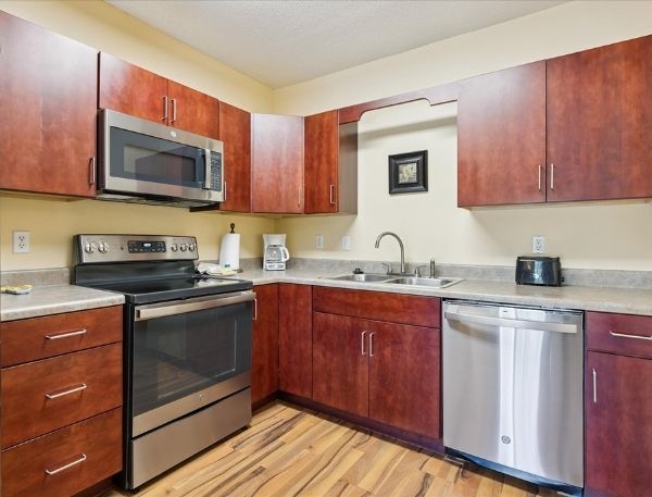 One Bedroom Whispering Pines Pigeon Forge Mountain Vacation Condo Rental by Smoky Mountain Escapes with Indoor Pool Outdoor Pool Lazy River Near Dollywood