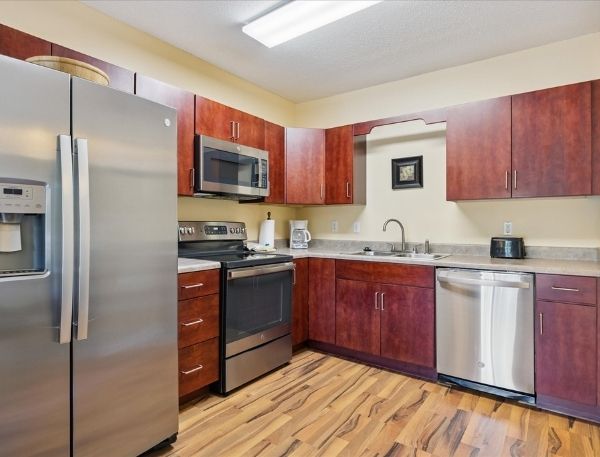 One Bedroom Whispering Pines Pigeon Forge Mountain Vacation Condo Rental by Smoky Mountain Escapes with Indoor Pool Outdoor Pool Lazy River Near Dollywood